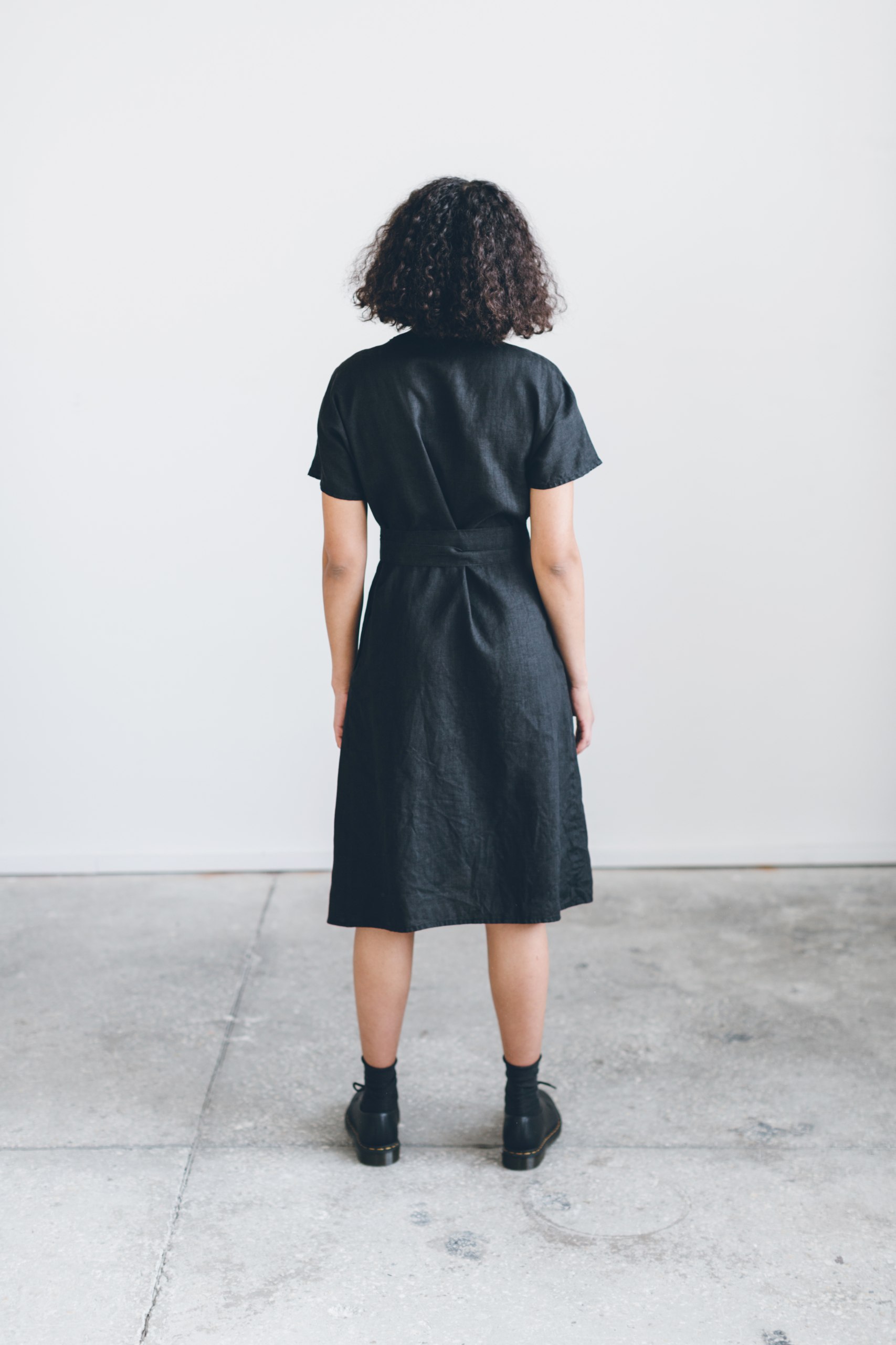 The back of black linen dress