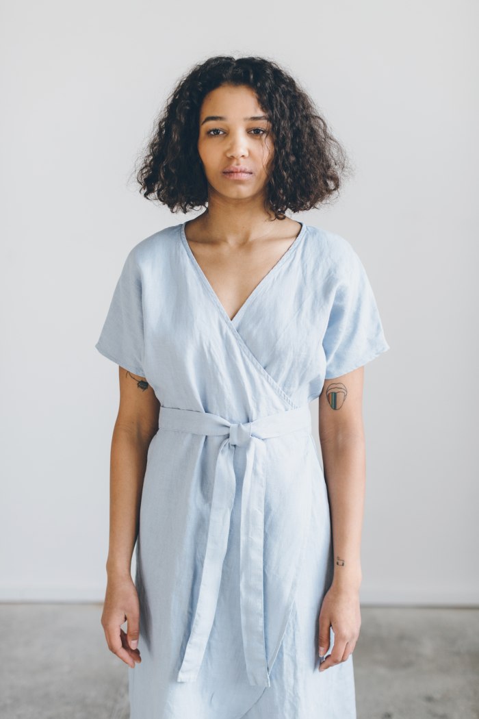A front a light blue linen wrap dress