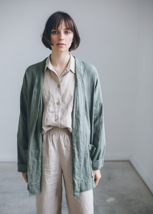 Model wearing relaxed outfit made of linen