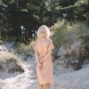 The back pastel pink linen wrap dress