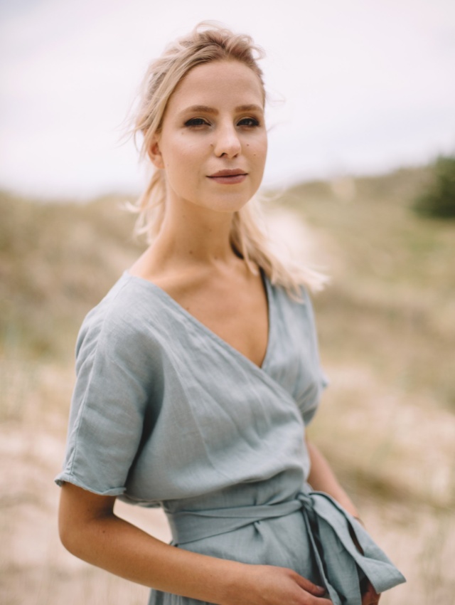 Top part of muted blue a summer linen dress.