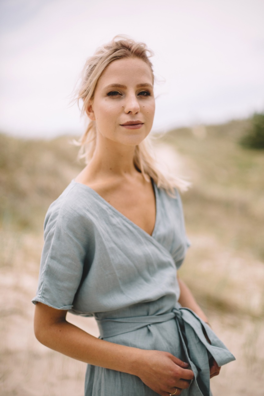 Top part of muted blue a summer linen dress.