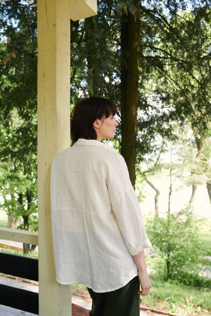 The back of white linen oversized button down