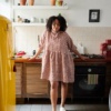 Oversized gingham dress wearing by lady at home