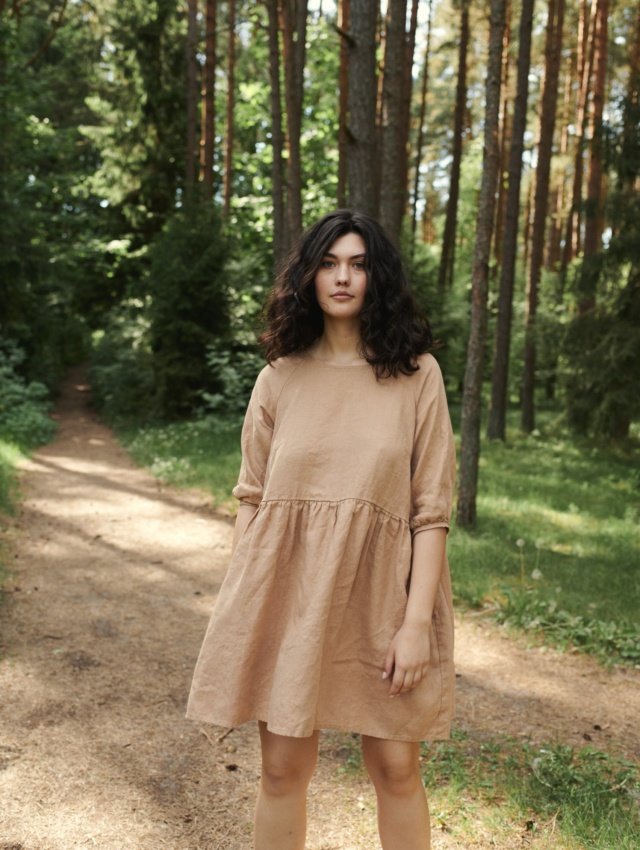 Women in nature wearing nice raglan dress