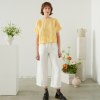 Linenfox model in short sleeve summer linen top in yellow gingham