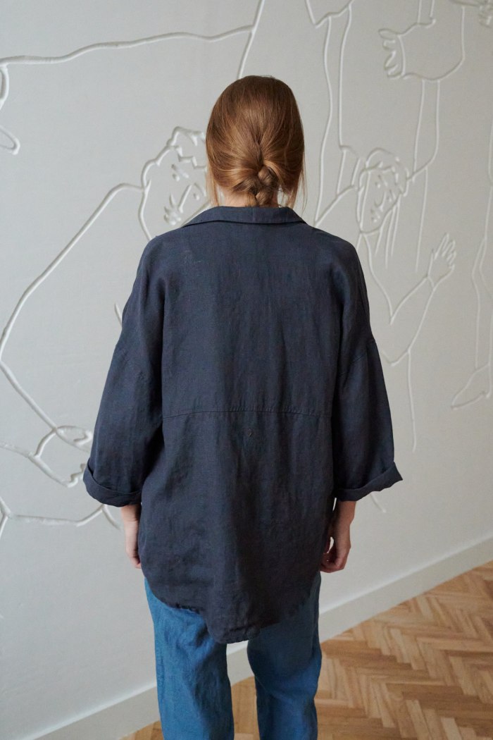model wearing long linen shirt