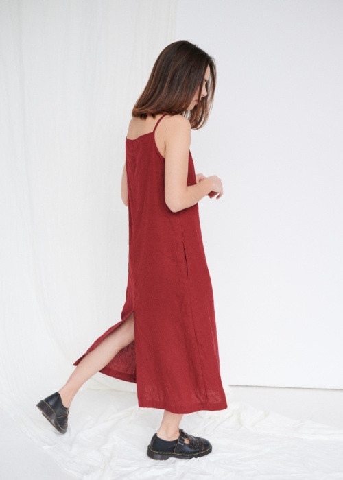 Maxi length linen dress with spaghetti sleeves and pockets