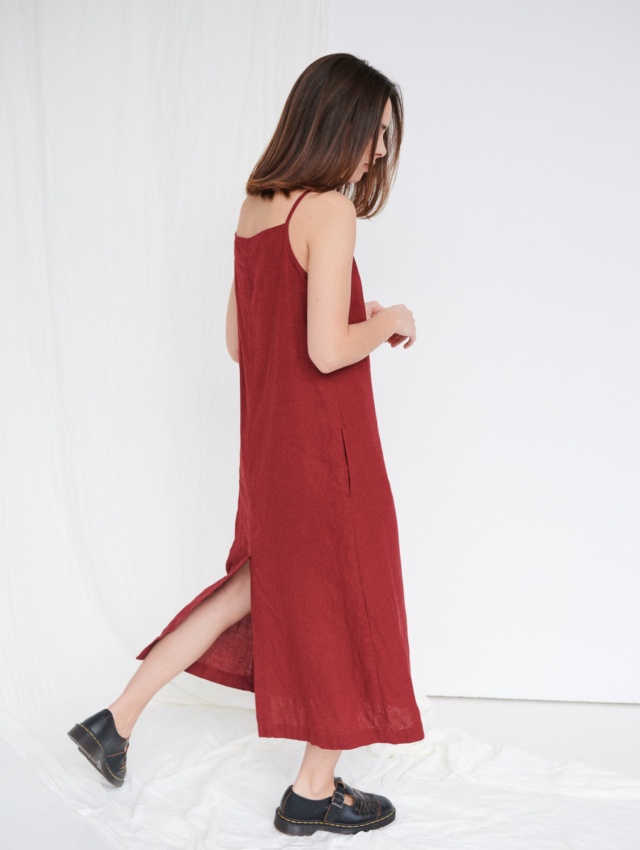 Maxi length linen dress with spaghetti sleeves and pockets