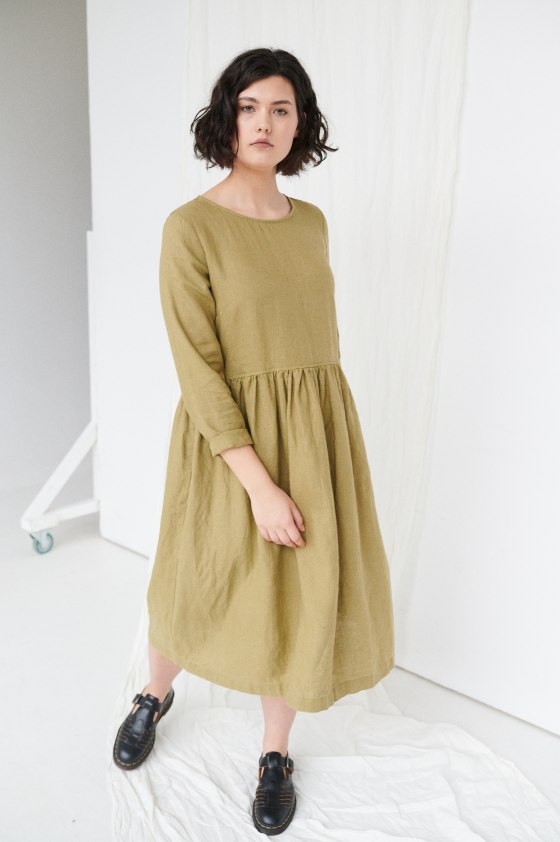 Model wearing versatile long linen dress