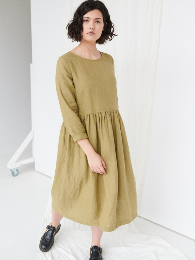 Model wearing versatile long linen dress