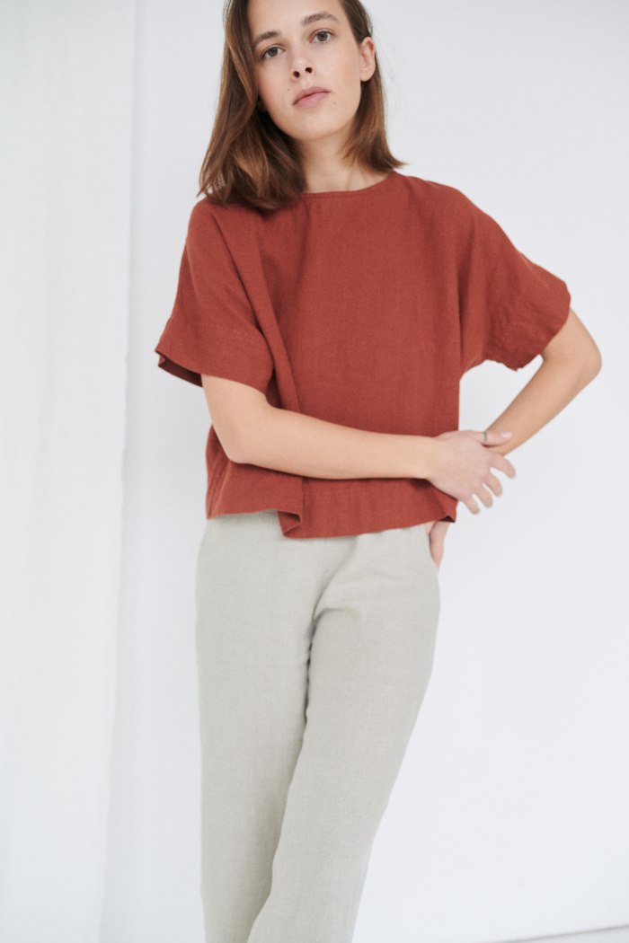 A model in short sleeve boxy linen top