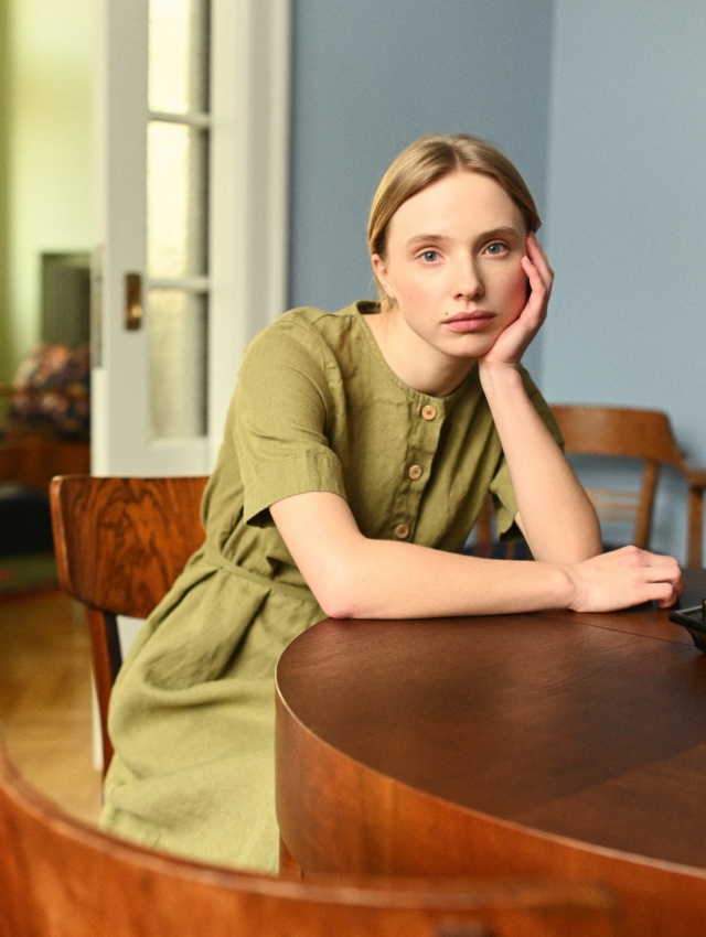 Romantic lady with olive linen dress