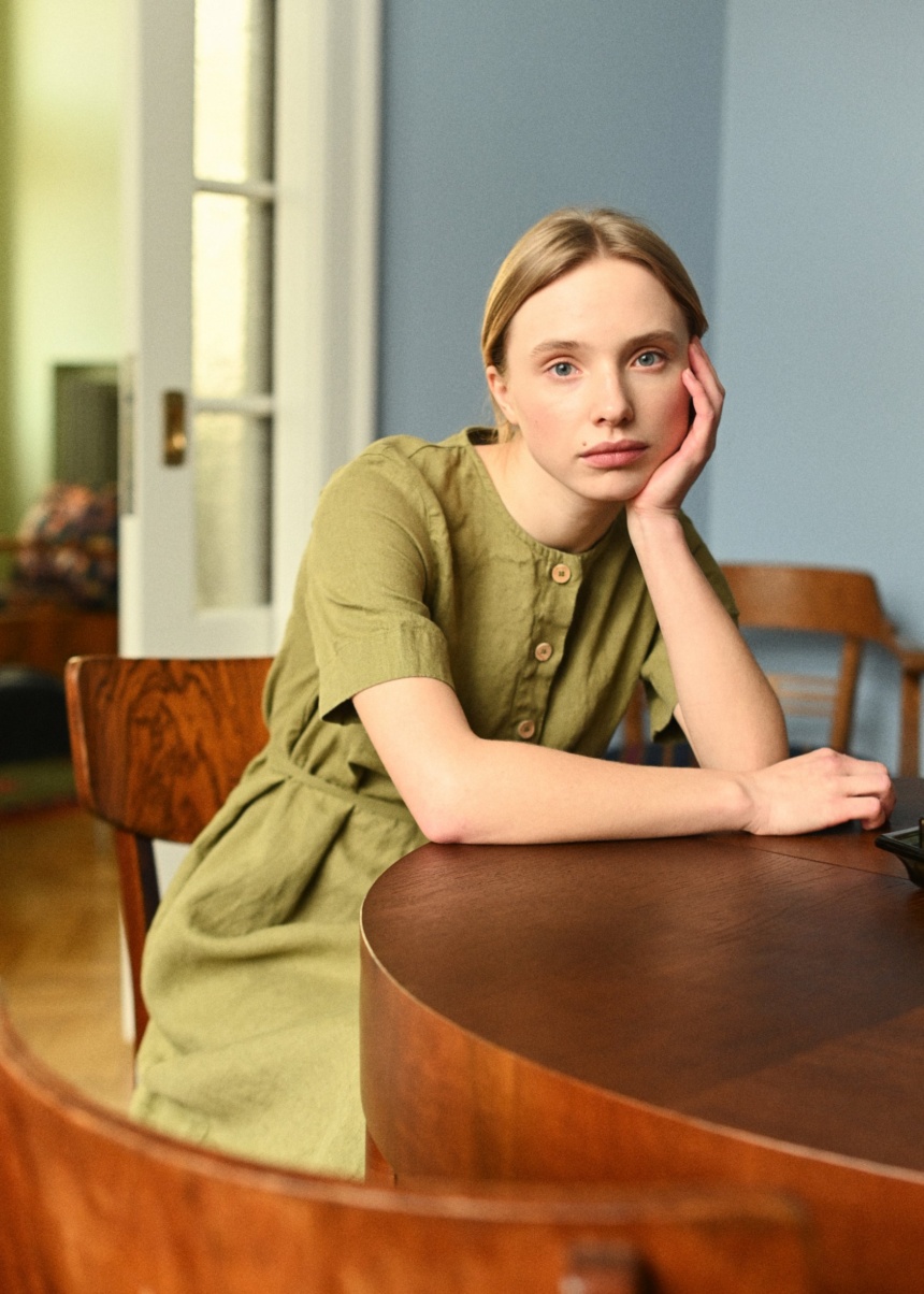 Romantic lady with olive linen dress