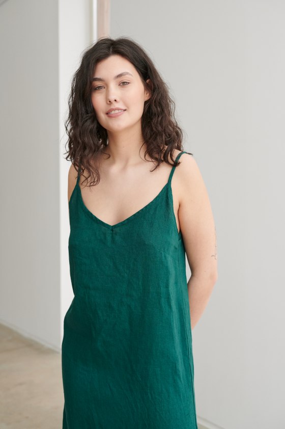 Loose-fitting beach linen dress with spaghetti sleeves