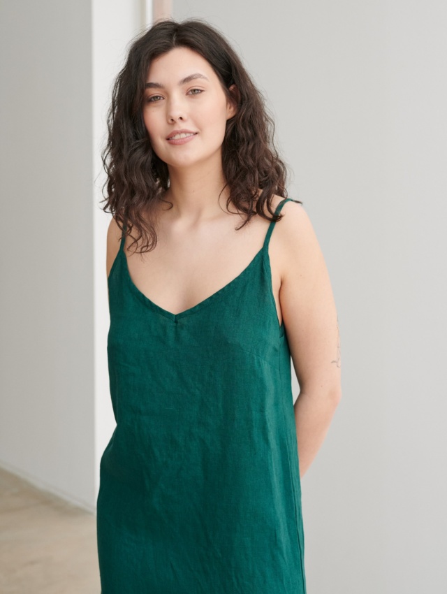 Loose-fitting beach linen dress with spaghetti sleeves