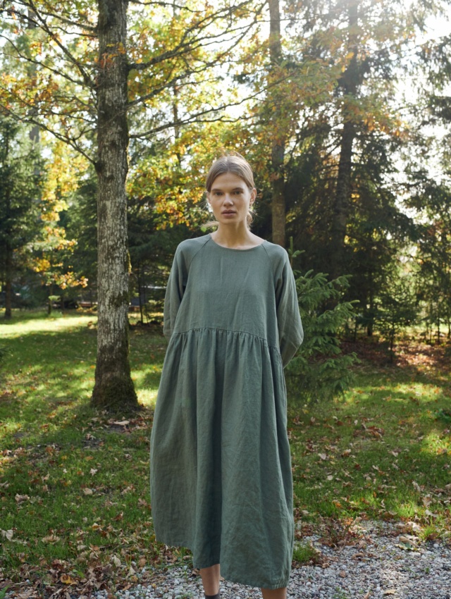 A woman in an oversized linen smock dress