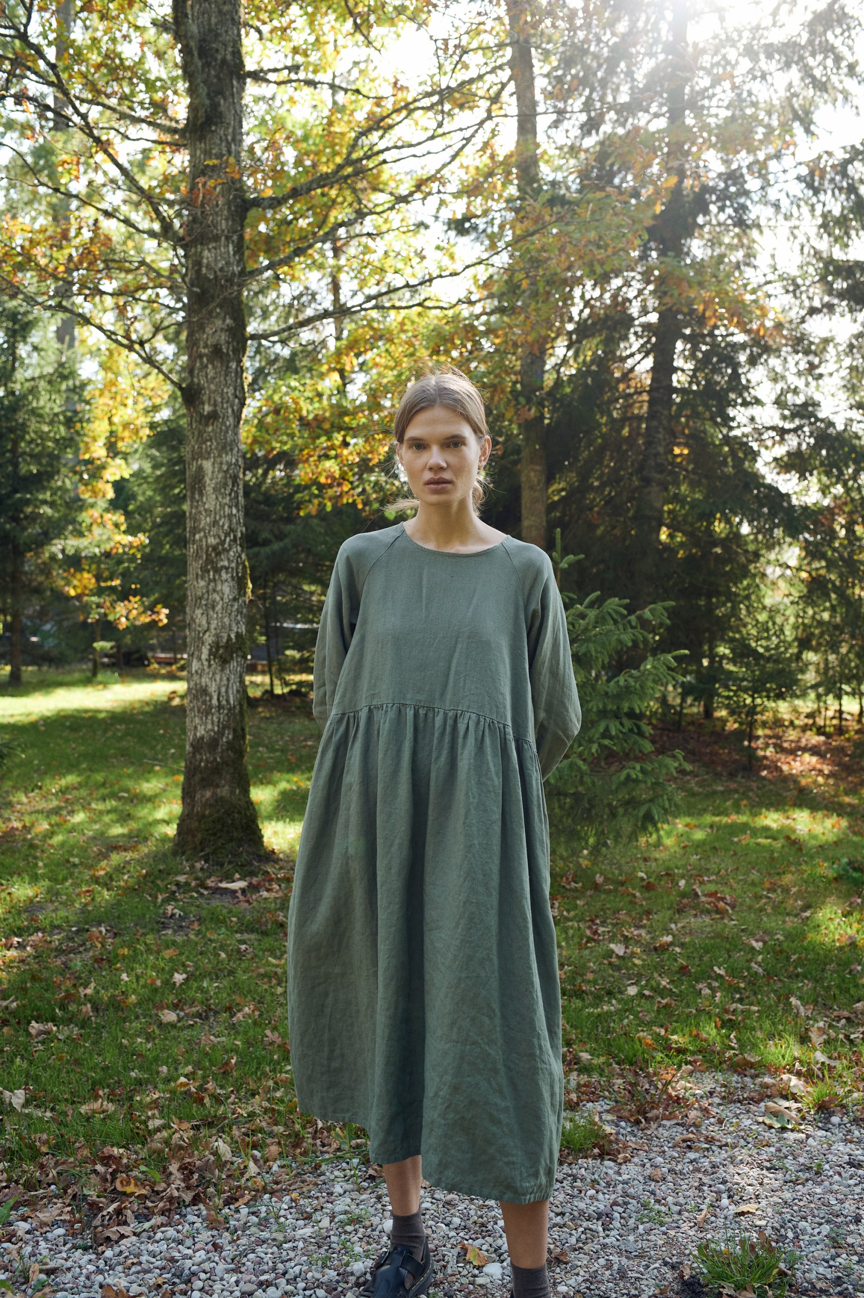A woman in an oversized linen smock dress