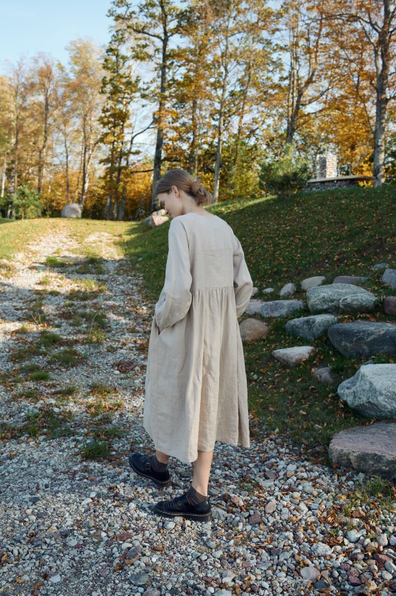 The back of beige linen smock dress