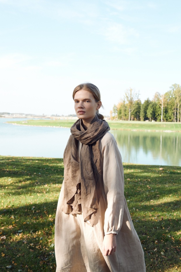 Lady wearing lightweight linen fabric scarf