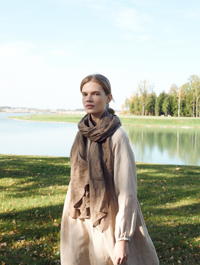 Lady wearing lightweight linen fabric scarf