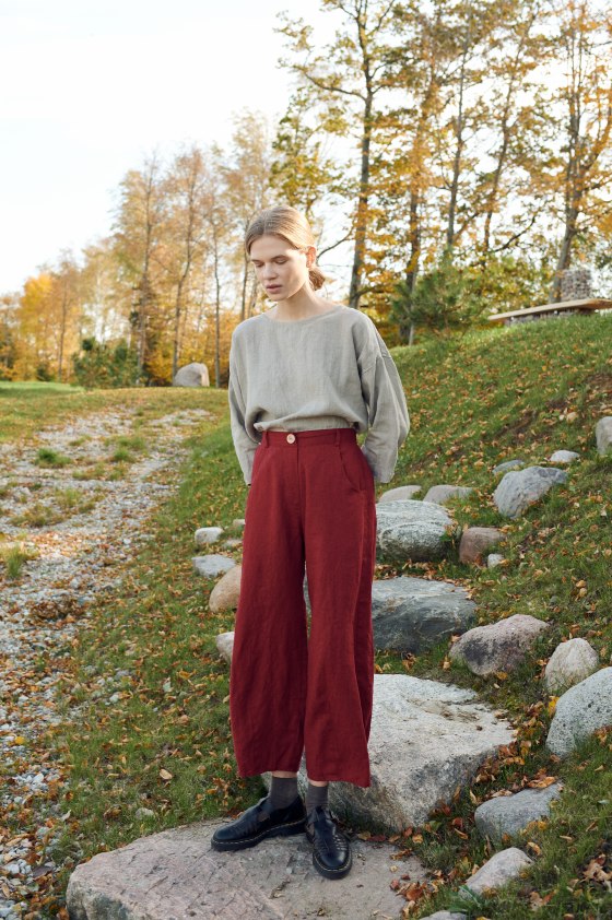 A woman in barrel shaped linen pants