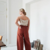 The back of brown high waisted trousers in heavy linen