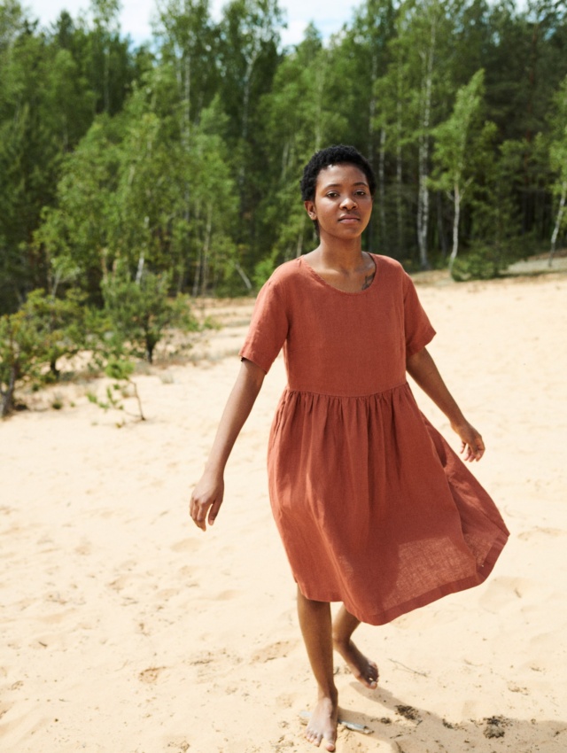 Lady wearing linen dress in nature