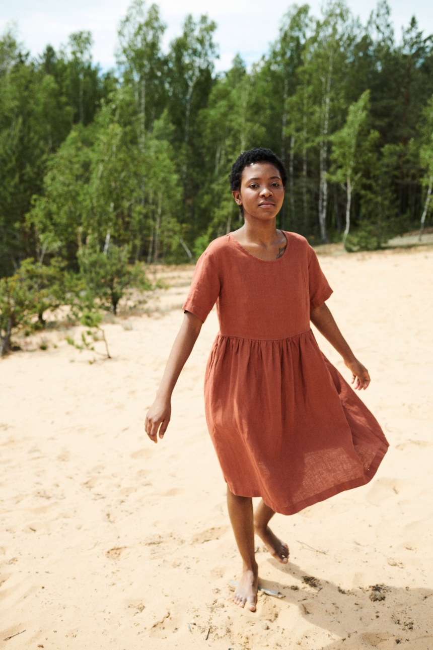 Lady wearing linen dress in nature