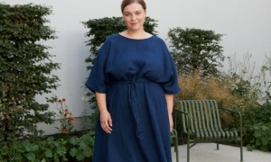 Women in garden with blue linen dress