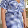 Front of linen wrap dress in blue gingham