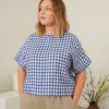 Linenfox model in short sleeve cropped blue gingham linen top
