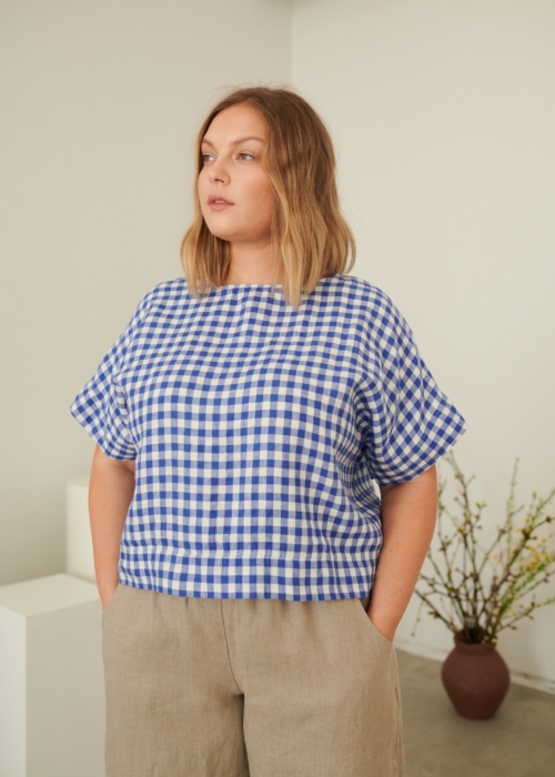 Linenfox model in short sleeve cropped blue gingham linen top