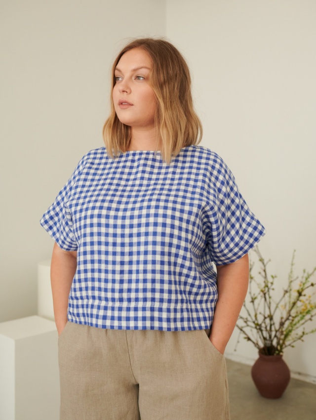 Linenfox model in short sleeve cropped blue gingham linen top