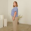 Linenfox model in oversized blue gingham top