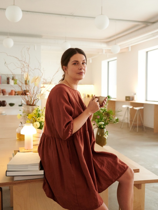 Enjoying comfy linen dress at studio