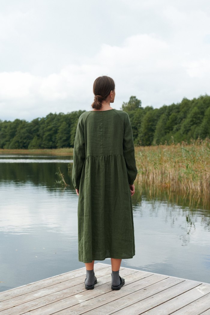 The back of oversized linen dress in forest green