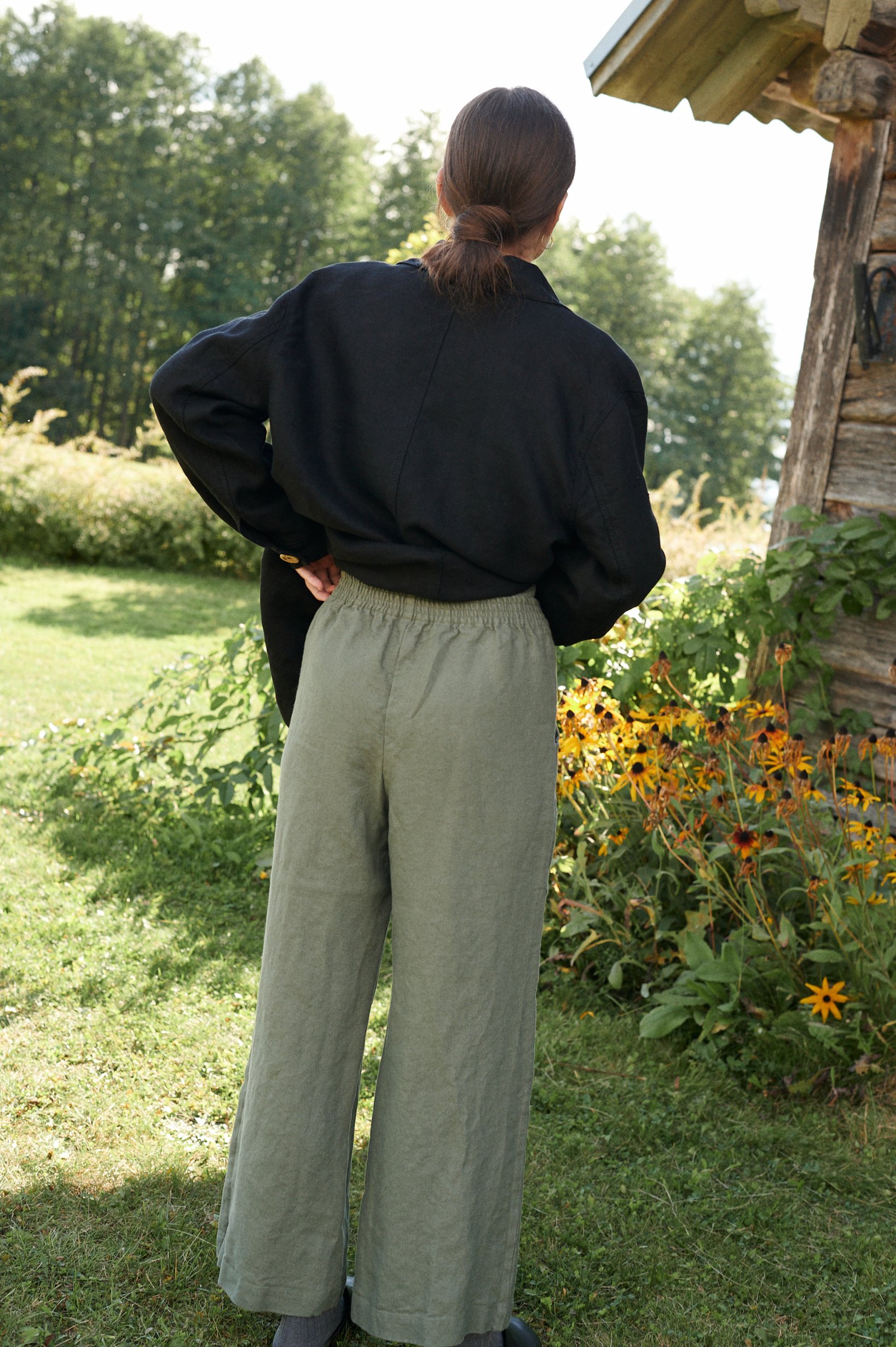 The back of green natural linen wide leg trousers