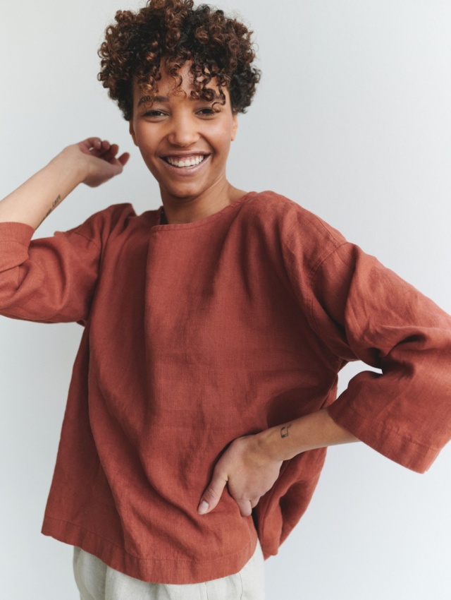 Happy women wearing oversize linen top