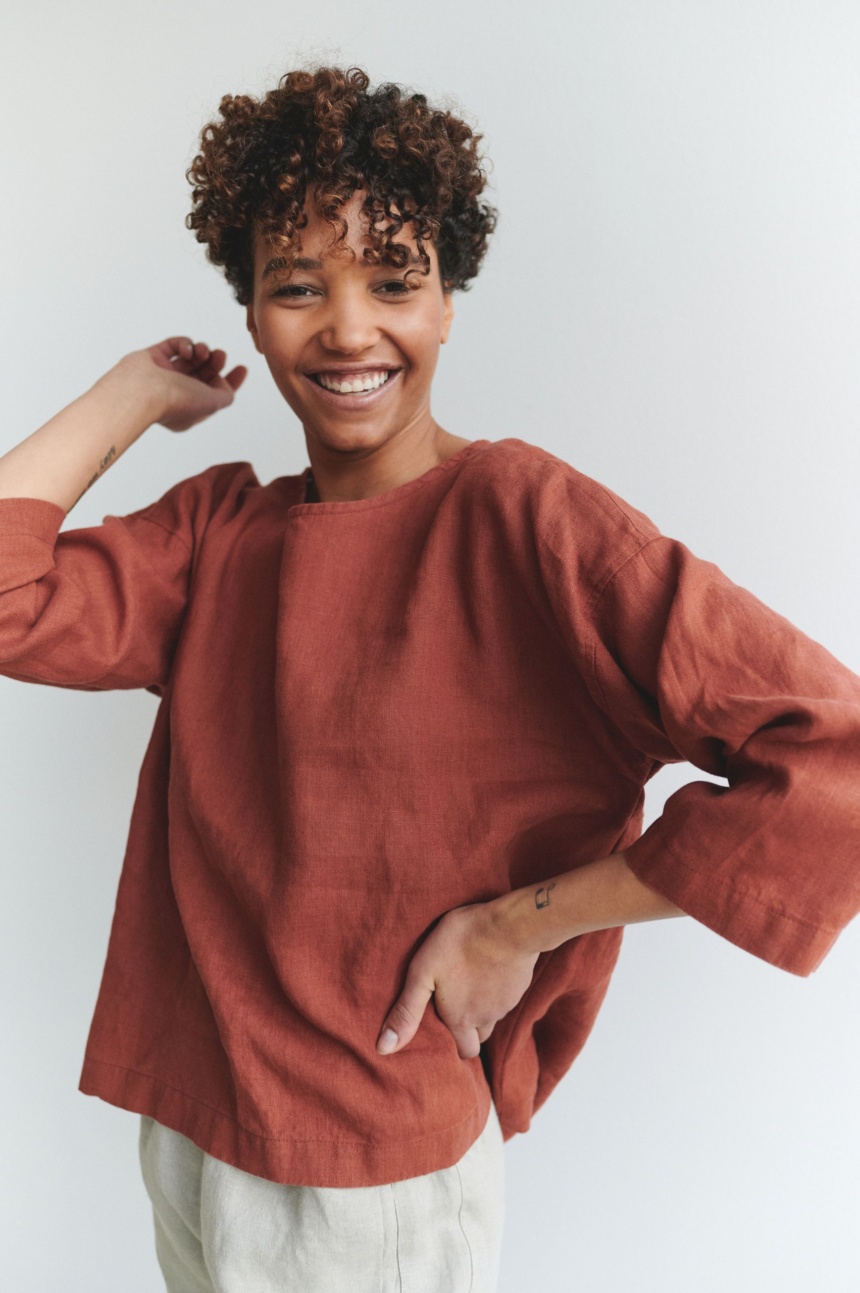 Happy women wearing oversize linen top