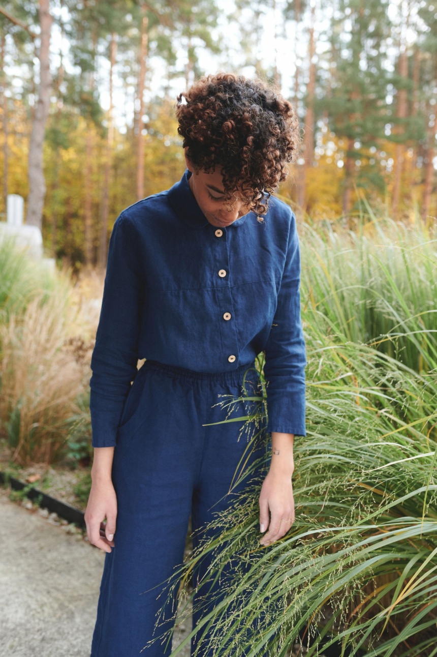 Women with navy blue linen apparel at garden