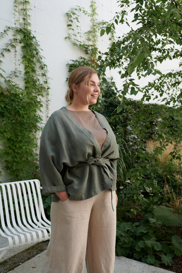 An oversized heavy-weight linen jacket tied with a belt