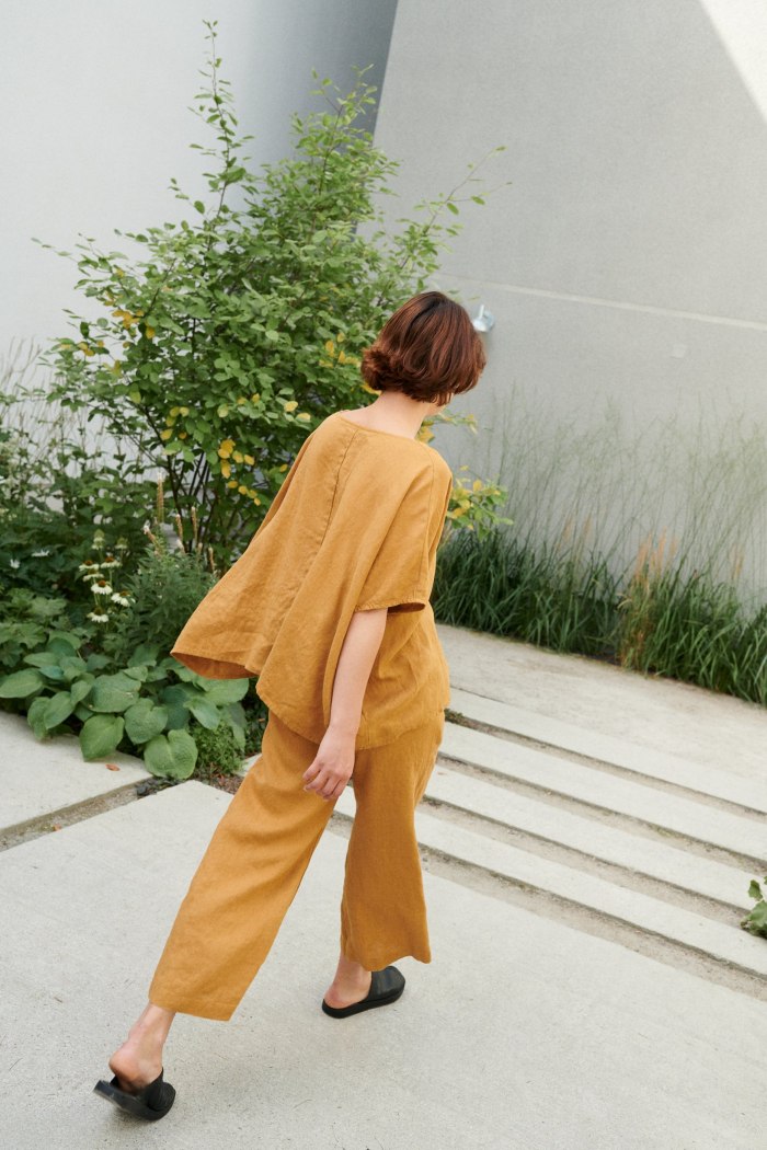 A flowy loose-fitting linen top paired with matching wide-leg linen trousers