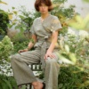 Grey stripes wrap-type linen jumpsuit with dropped shoulders