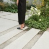 Women is wearing black linen dress