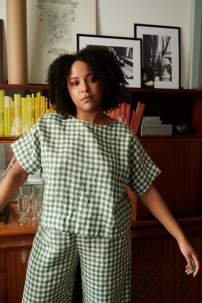 A model wearing oversized straight cut linen top in green gingham
