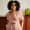 Gingham linen wrap dress on a woman