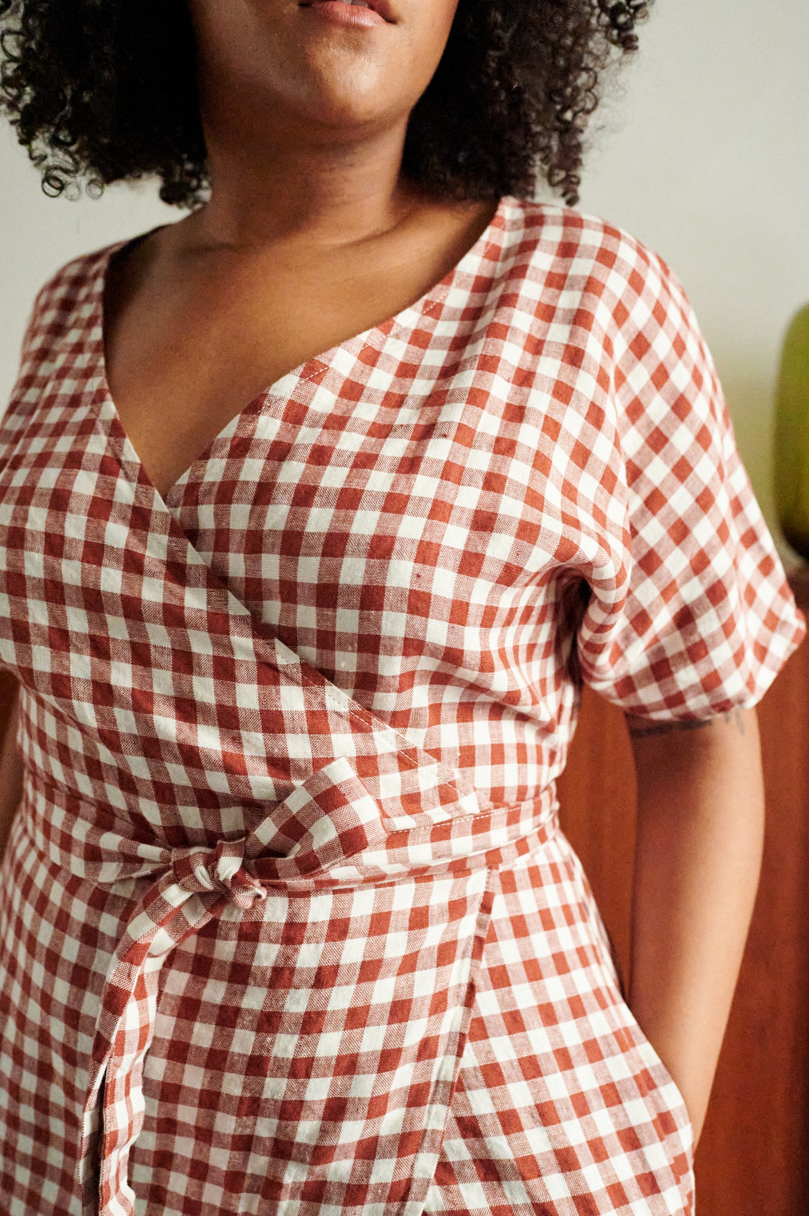 front of the natural linen wrap dress in gingham