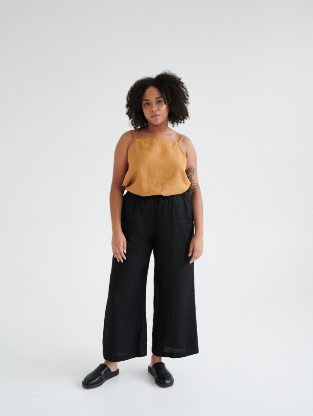 Women wearing black linen culottes