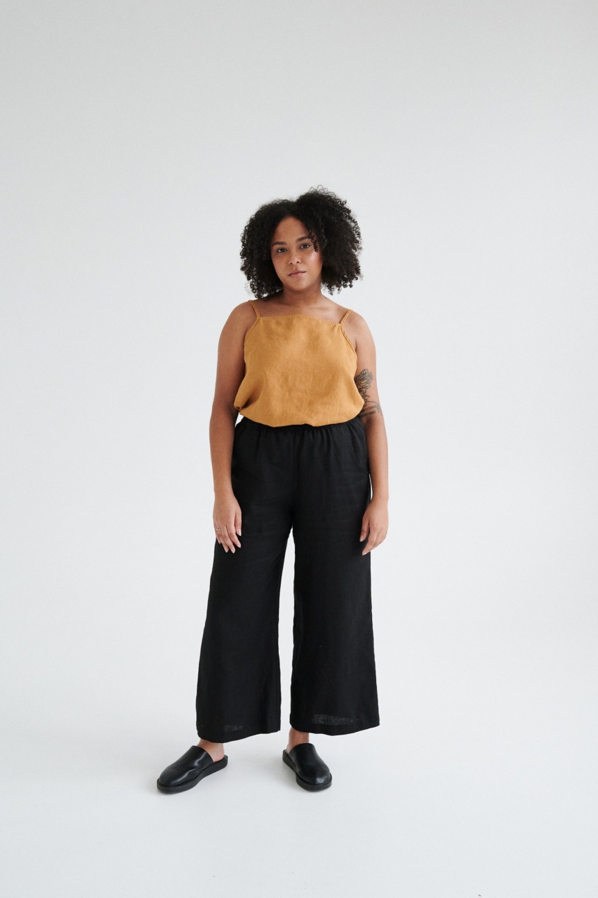 Women wearing black linen culottes